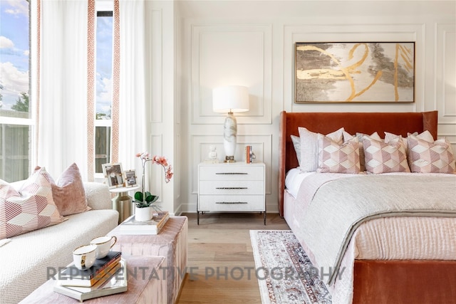 bedroom with wood finished floors