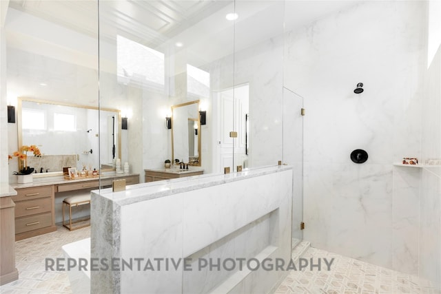full bath with vanity and a marble finish shower