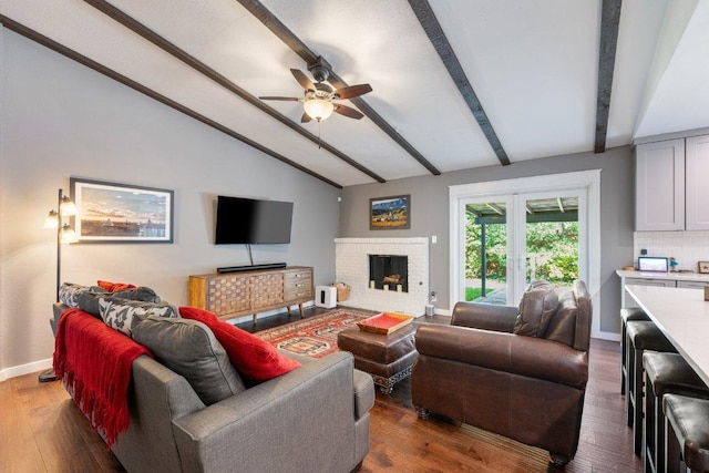 5310 Fort Clark Dr, Austin, TX 78745 - living area featuring a ceiling fan, baseboards, wood finished floors, and a fireplace