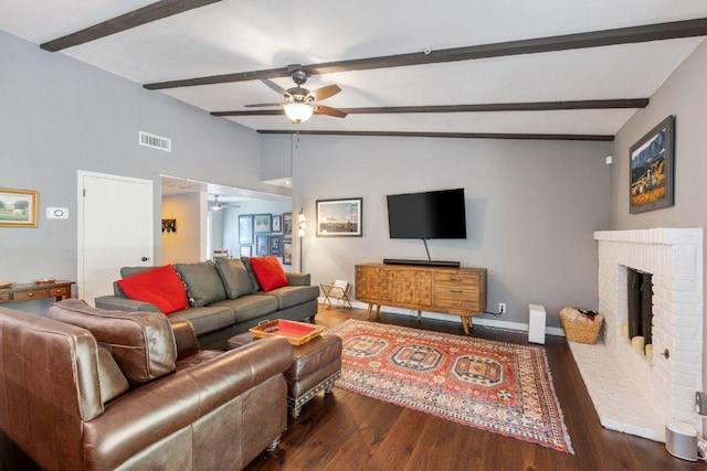 5310 Fort Clark Dr, Austin, TX 78745 - living room featuring ceiling fan, wood finished floors, a fireplace, and baseboards