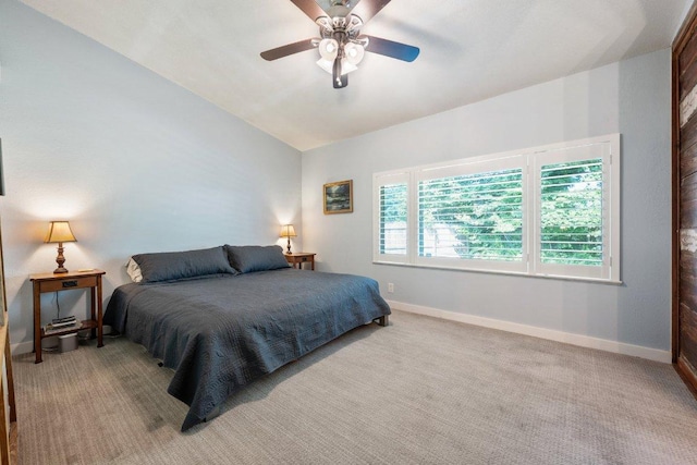 5310 Fort Clark Dr, Austin, TX 78745 - carpeted bedroom featuring baseboards, vaulted ceiling, and ceiling fan