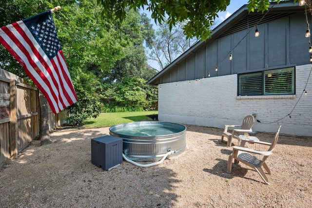 5310 Fort Clark Dr, Austin, TX 78745 - view of yard with a jacuzzi
