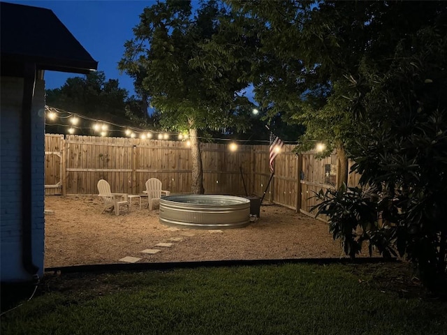 5310 Fort Clark Dr, Austin, TX 78745 - view of yard at twilight