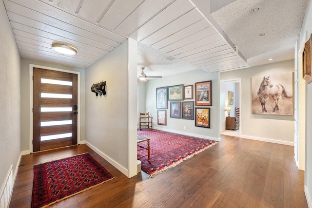 5310 Fort Clark Dr, Austin, TX 78745 - entryway featuring wood-type flooring, baseboards, and ceiling fan