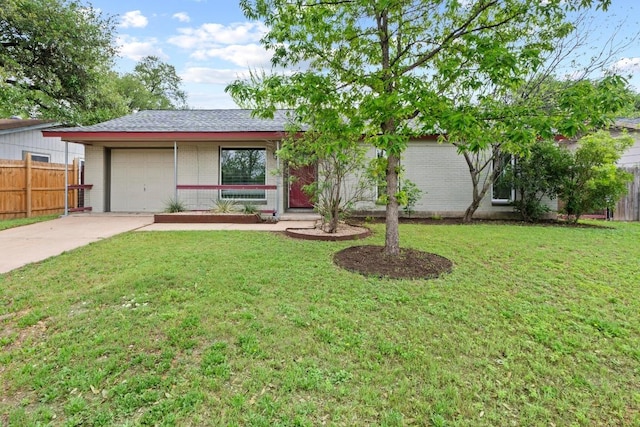 7003 Priscilla Dr, Austin, TX 78752 - single story home with driveway, brick siding, and an attached garage