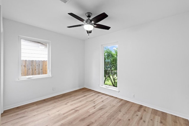 7003 Priscilla Dr, Austin, TX 78752 - empty room with light wood finished floors and a ceiling fan