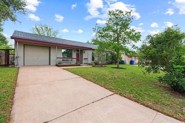 7003 Priscilla Dr, Austin, TX 78752 - ranch-style home featuring a garage, concrete driveway, brick siding, and a front yard