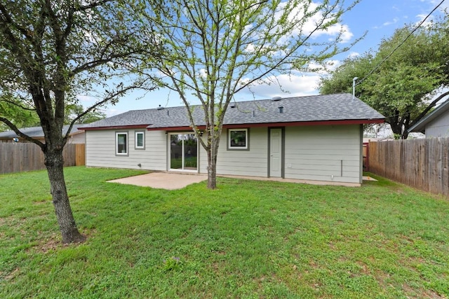 7003 Priscilla Dr, Austin, TX 78752 - back of house featuring a fenced backyard, a patio area, and a shingled roof