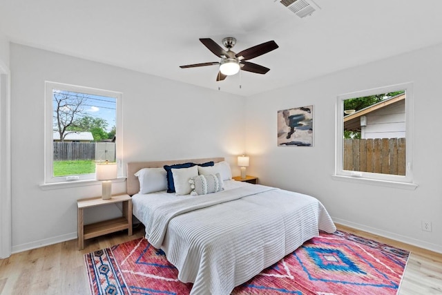 7003 Priscilla Dr, Austin, TX 78752 - bedroom with light wood-style flooring and ceiling fan