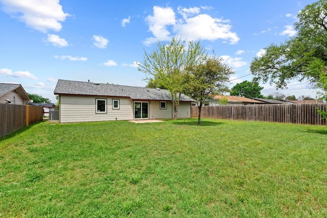 7003 Priscilla Dr, Austin, TX 78752 - back of property featuring a fenced backyard and a patio area