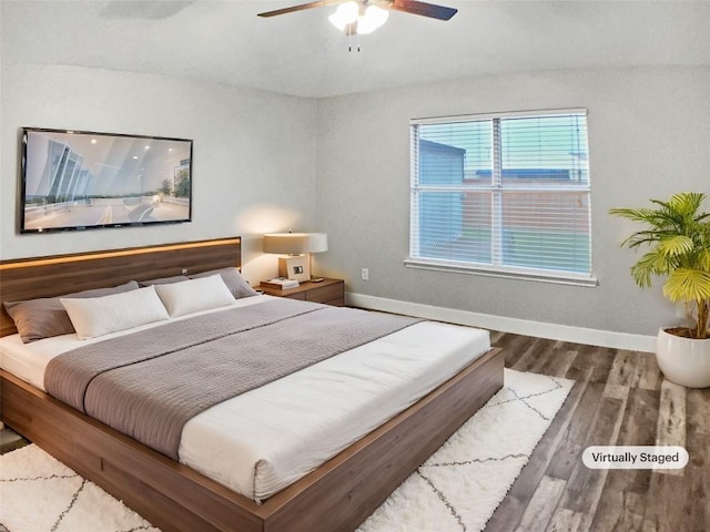 1608 Mallard Ln, Taylor, TX 76574 - bedroom with wood finished floors and a ceiling fan