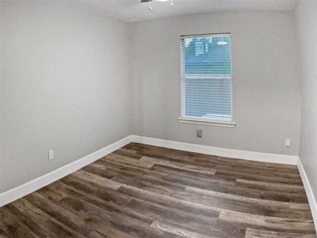 1608 Mallard Ln, Taylor, TX 76574 - unfurnished room with dark wood-style flooring and a ceiling fan
