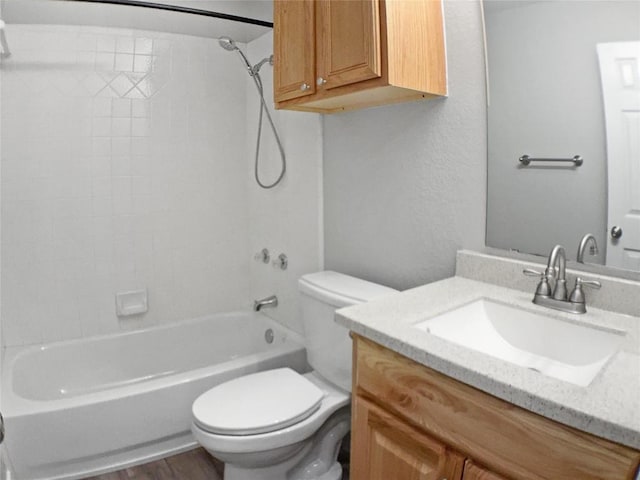 1608 Mallard Ln, Taylor, TX 76574 - bathroom with vanity, bathing tub / shower combination, and wood finished floors