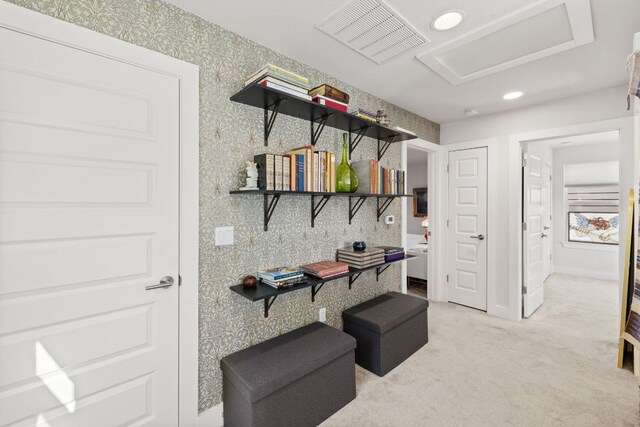 1900 Teagle Dr, Austin, TX 78741 - corridor featuring light colored carpet, wallpapered walls, recessed lighting, and baseboards