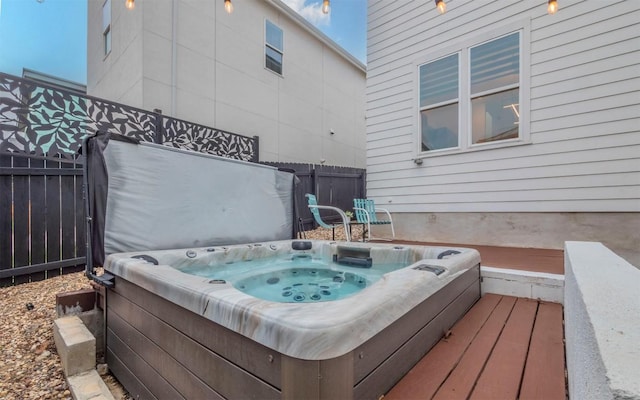6221 Florencia Ln, Austin, TX 78724 - wooden terrace featuring a covered hot tub