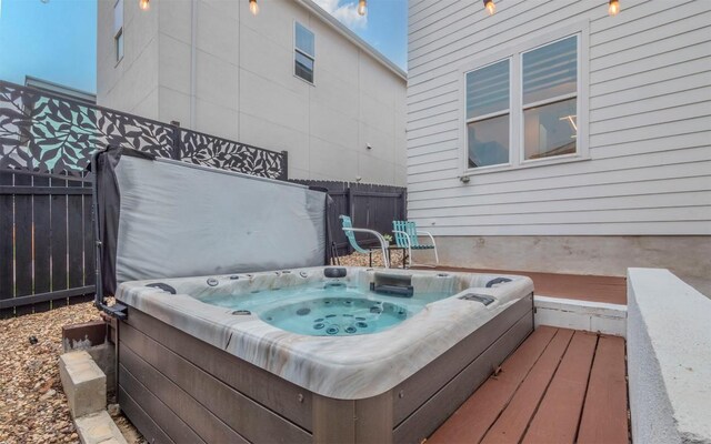 6221 Florencia Ln, Austin, TX 78724 - wooden terrace featuring a covered hot tub