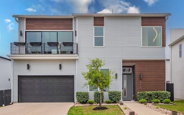 6221 Florencia Ln, Austin, TX 78724 - contemporary house with a balcony, a garage, and driveway