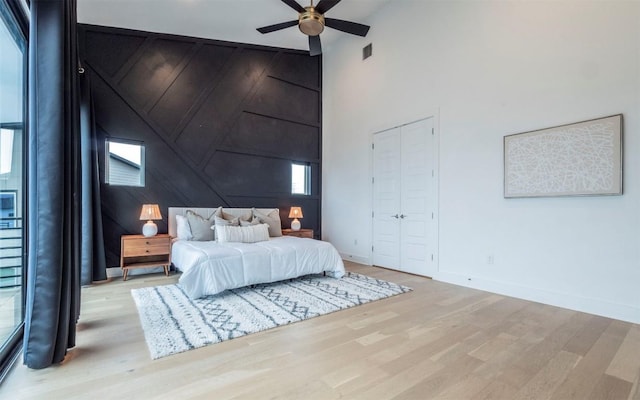 6221 Florencia Ln, Austin, TX 78724 - bedroom with wood finished floors, high vaulted ceiling, and ceiling fan