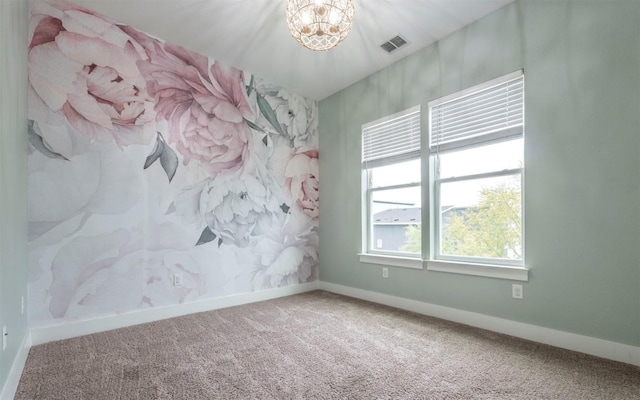 6221 Florencia Ln, Austin, TX 78724 - carpeted empty room featuring a chandelier and baseboards