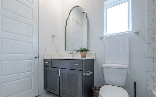 6221 Florencia Ln, Austin, TX 78724 - full bathroom with vanity and toilet
