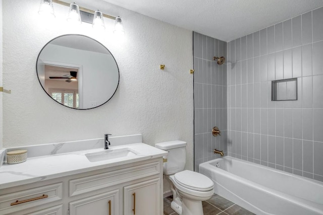 313 Lucy Ln, Horseshoe Bay, TX 78657 - bathroom with toilet, vanity, shower / bathtub combination, a textured wall, and a textured ceiling