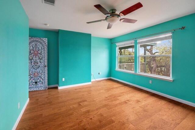 4142 Rockwood Dr, Lago Vista, TX 78645 - spare room featuring wood finished floors and ceiling fan