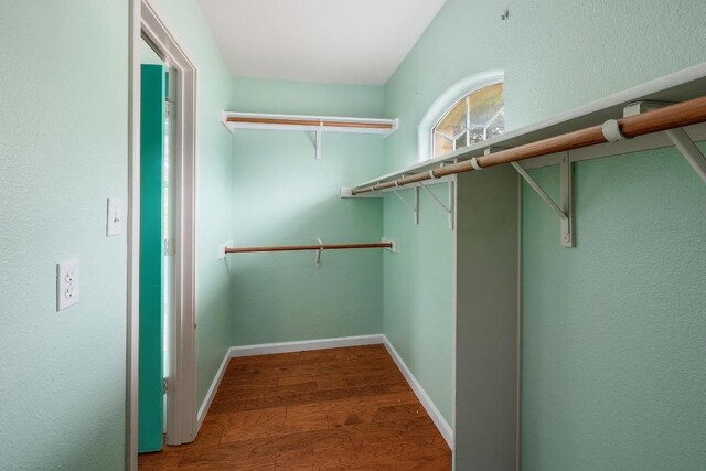 4142 Rockwood Dr, Lago Vista, TX 78645 - walk in closet with wood finished floors