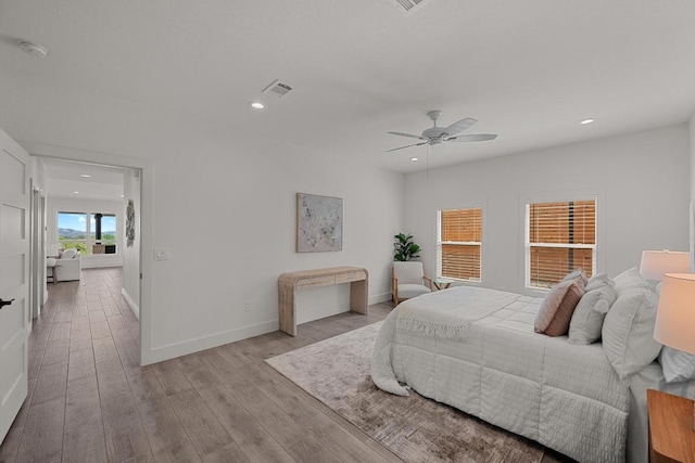 509 Flamingo Blvd, Lakeway, TX 78734 - bedroom featuring wood finished floors, recessed lighting, and ceiling fan