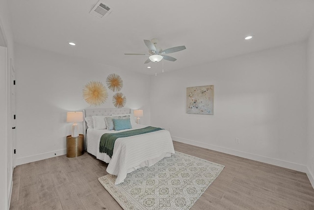 509 Flamingo Blvd, Lakeway, TX 78734 - bedroom with baseboards, light wood-style floors, recessed lighting, and a ceiling fan
