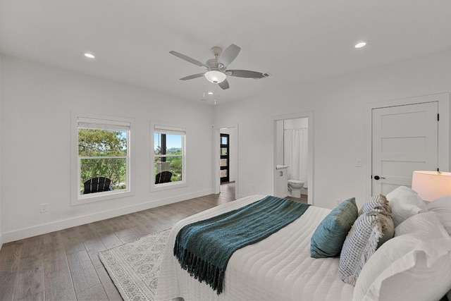 509 Flamingo Blvd, Lakeway, TX 78734 - bedroom with recessed lighting, wood finished floors, connected bathroom, and ceiling fan