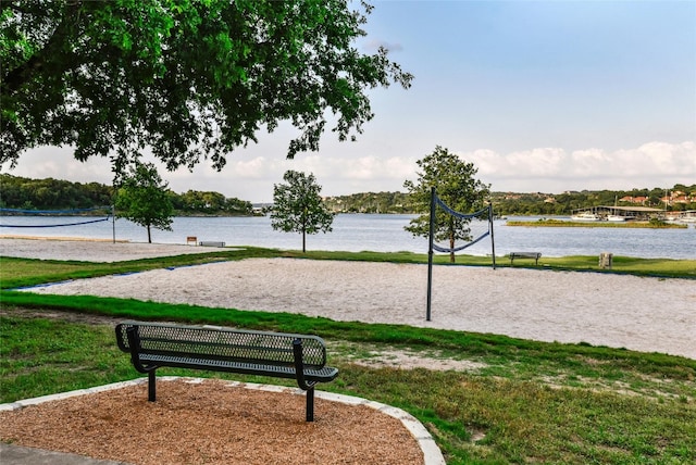 509 Flamingo Blvd, Lakeway, TX 78734 - view of community with volleyball court, a lawn, and a water view