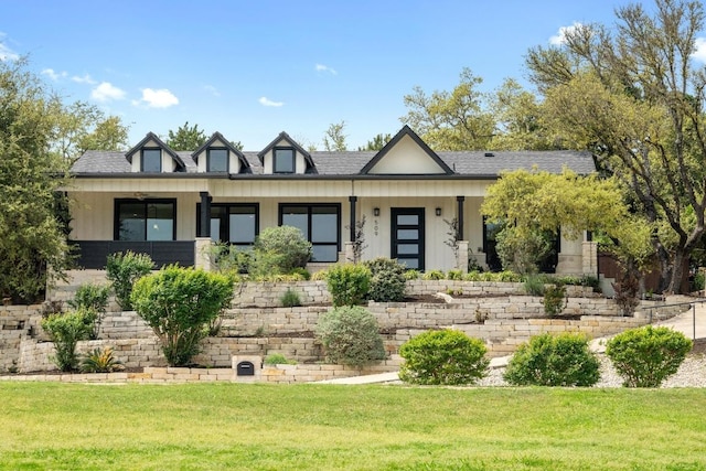 509 Flamingo Blvd, Lakeway, TX 78734 - view of front facade with a front lawn and roof with shingles