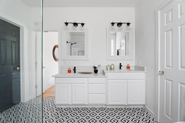 102 Hurst Creek Rd, Lakeway, TX 78734 - bathroom featuring a shower and double vanity