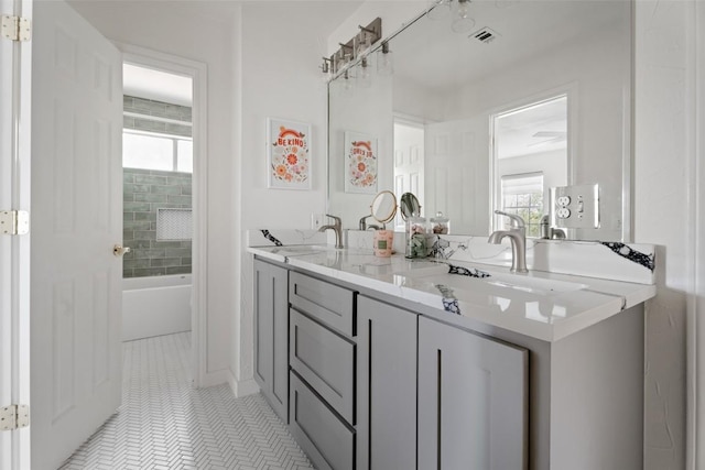 102 Hurst Creek Rd, Lakeway, TX 78734 - full bath featuring double vanity,  shower combination, and tile patterned flooring