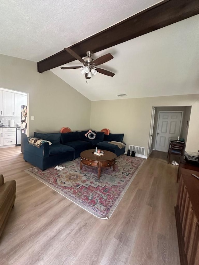 513 Purple Sage Dr, Round Rock, TX 78681 - living area with a ceiling fan and light wood-style floors