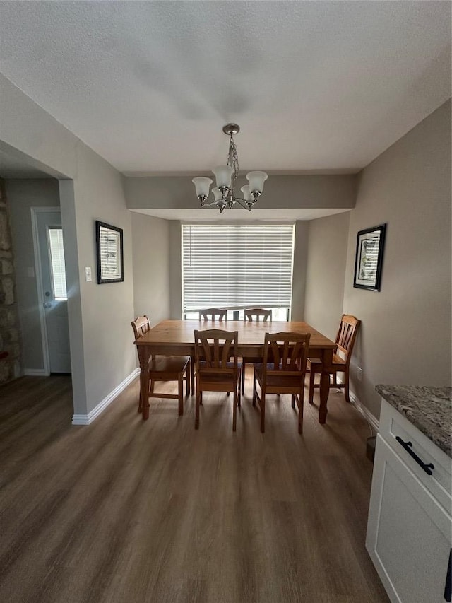 513 Purple Sage Dr, Round Rock, TX 78681 - dining room with dark wood-style flooring and a chandelier