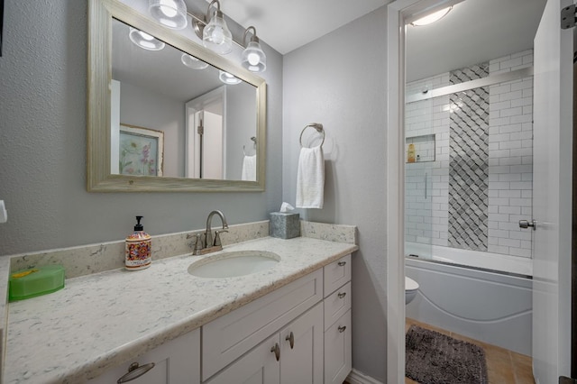 1135 Barton Hills Dr Unit 136, Austin, TX 78704 - bathroom featuring vanity and bath / shower combo with glass door
