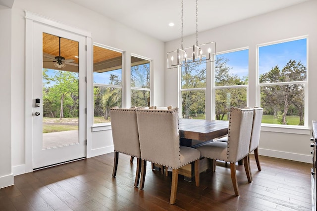 25101 Fawn Dr, Leander, TX 78641 - dining room featuring a chandelier, dark wood finished floors, recessed lighting, baseboards, and a ceiling fan
