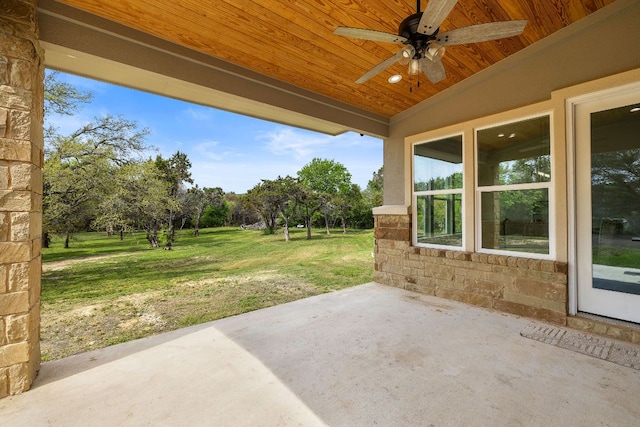 25101 Fawn Dr, Leander, TX 78641 - view of patio with ceiling fan and view of wooded area