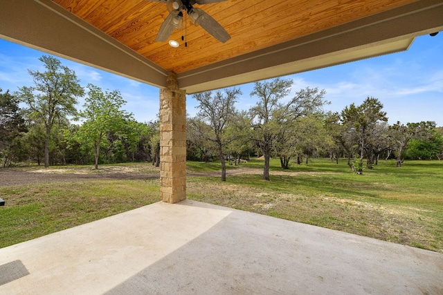 25101 Fawn Dr, Leander, TX 78641 - view of patio / terrace with ceiling fan and view of wooded area