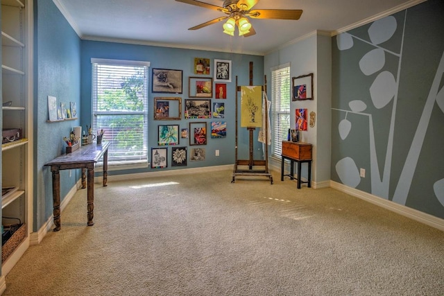 living area featuring ornamental molding, carpet, baseboards, and ceiling fan