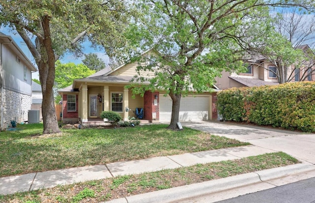 2312 Mcgregor Ln, Cedar Park, TX 78613 - view of front facade featuring driveway, a front lawn, brick siding, a garage, and cooling unit