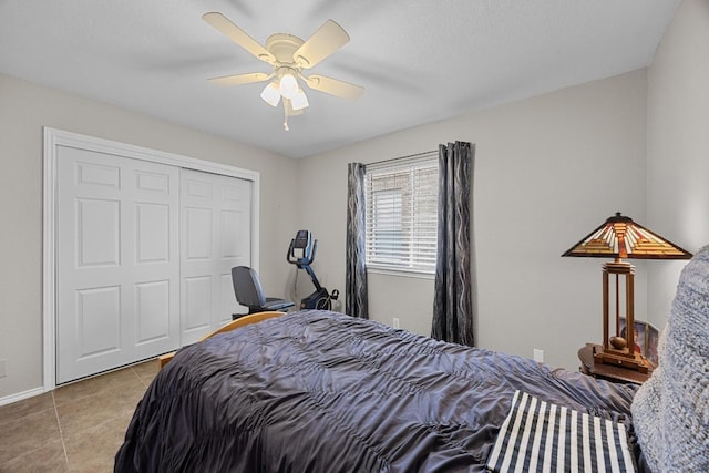 2312 Mcgregor Ln, Cedar Park, TX 78613 - tiled bedroom with a closet, ceiling fan, and baseboards