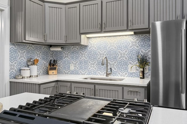 200 Oak Grove Dr, Dripping Springs, TX 78620 - kitchen featuring gray cabinets, freestanding refrigerator, and light countertops
