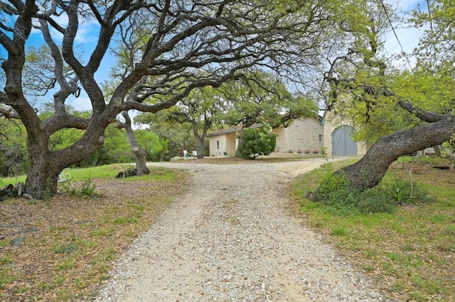 200 Oak Grove Dr, Dripping Springs, TX 78620 - view of front facade featuring curved driveway