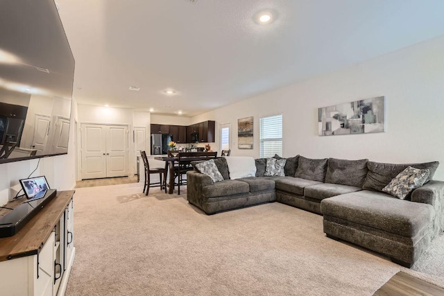 344 The Bad Way, Jarrell, TX 76537 - living area with light colored carpet and recessed lighting