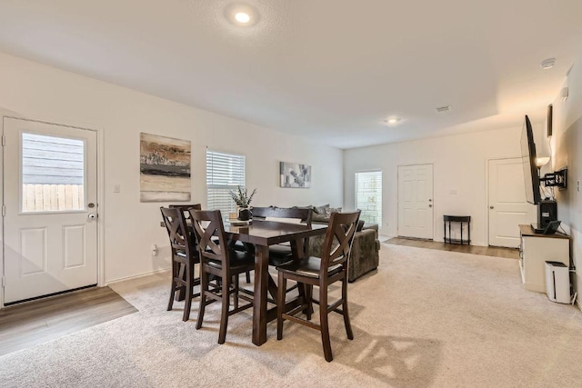 344 The Bad Way, Jarrell, TX 76537 - dining room with light wood-type flooring and recessed lighting