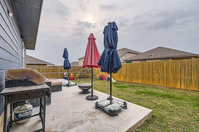 344 The Bad Way, Jarrell, TX 76537 - view of patio featuring a fire pit and a grill