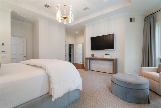 24729 Travis Lakeside Cv, Spicewood, TX 78669 - carpeted bedroom with ornamental molding, a chandelier, a raised ceiling, and recessed lighting