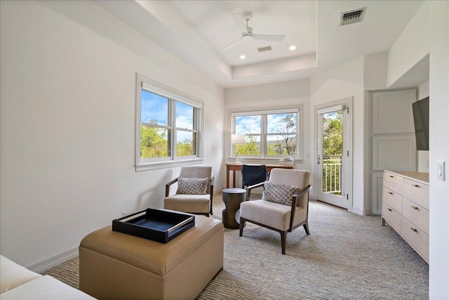 24729 Travis Lakeside Cv, Spicewood, TX 78669 - sitting room with ceiling fan, recessed lighting, and light carpet